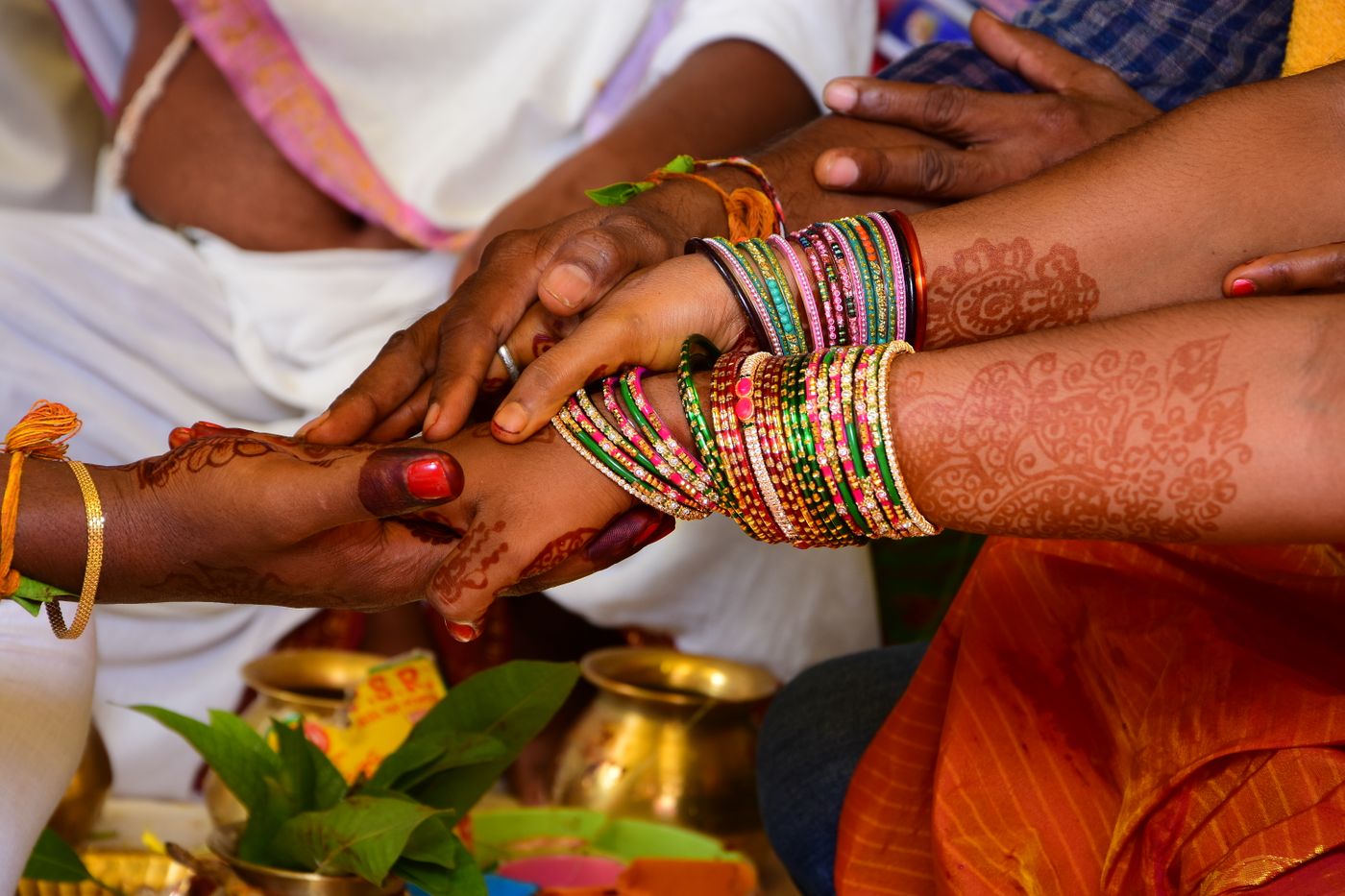 hands during a Hindu wedding ritual in Tamil Nadu