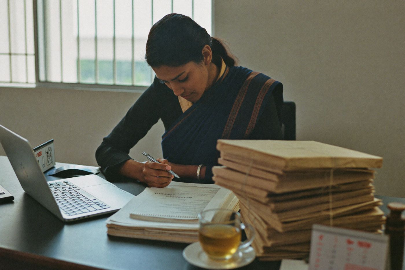Advocate reviewing divorce papers at YUVA Law Firm, Chennai